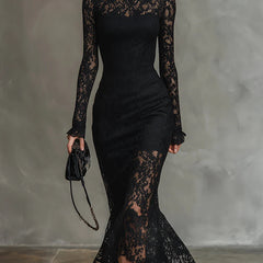 Black lace maxi dress named Julia by THE WHITMORE FAMILY, featuring a fitted silhouette and elegant lace fabric.