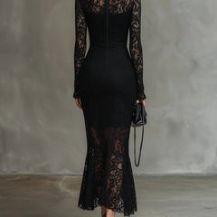 Black lace maxi dress named Julia by THE WHITMORE FAMILY, featuring elegant design and fitted silhouette.