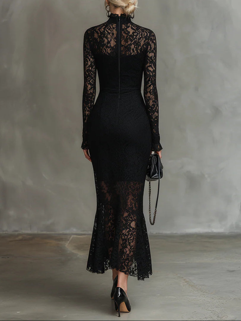 Black lace maxi dress named Julia by THE WHITMORE FAMILY, featuring elegant design and fitted silhouette.