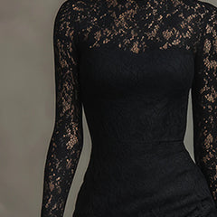 Black lace maxi dress named Julia by THE WHITMORE FAMILY, featuring elegant floor-length design and intricate lace details.
