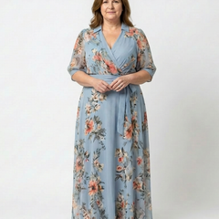 Elowen floral wrap V-neck maxi dress from THE WHITMORE FAMILY, featuring a flowing fabric and elegant floral pattern.