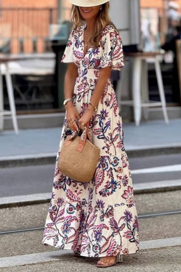 Purple floral print Joan maxi dress by THE WHITMORE FAMILY featuring puff sleeves and a flowing silhouette.