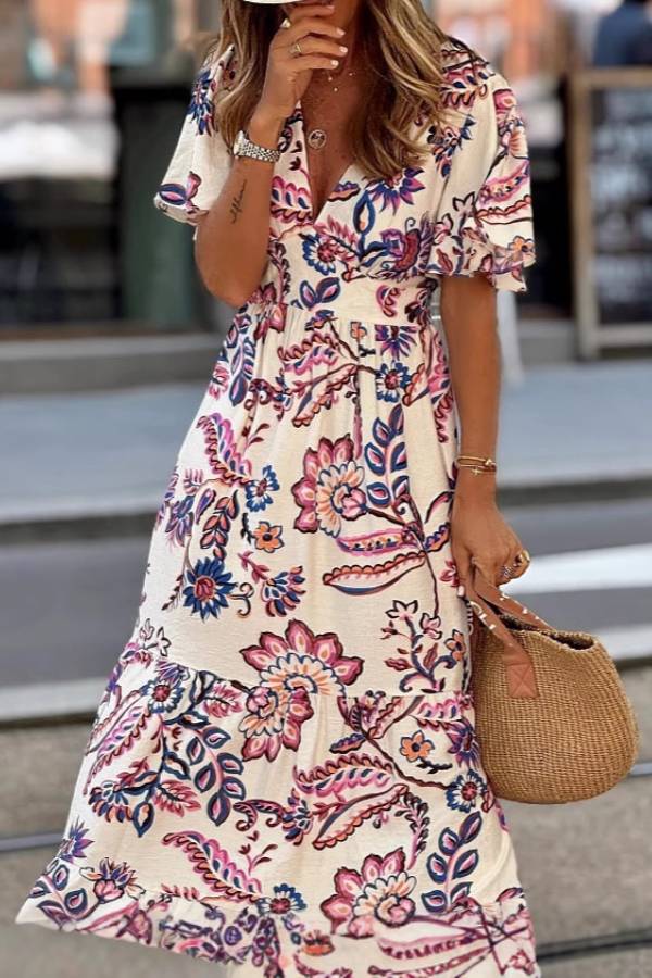 Purple floral print Joan maxi dress by THE WHITMORE FAMILY featuring puff sleeves and flowing fabric.