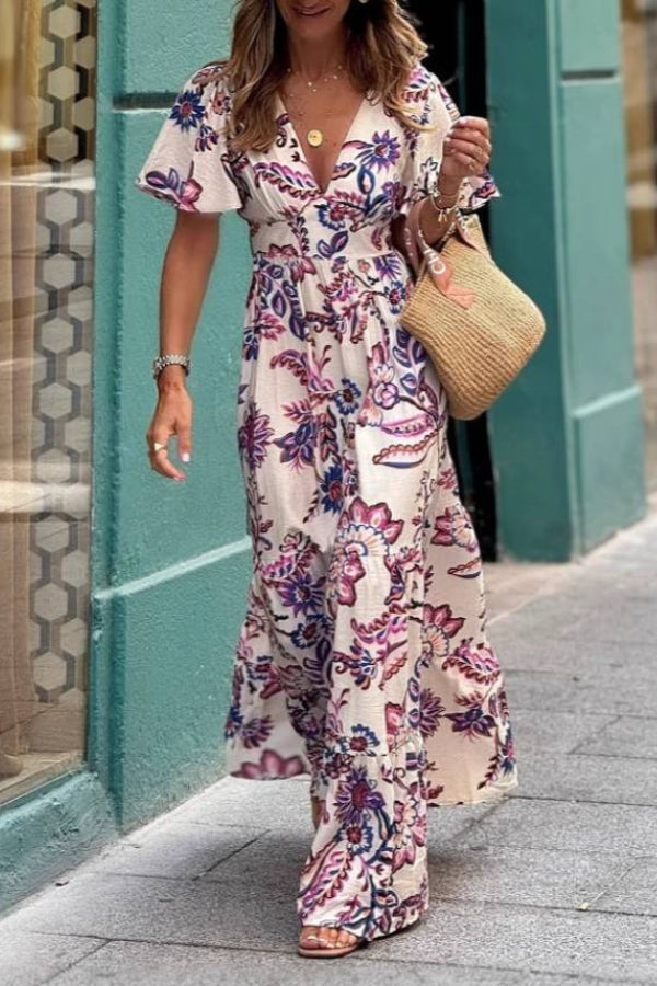 Purple floral print Joan maxi dress by THE WHITMORE FAMILY featuring puff sleeves and a flowing silhouette.