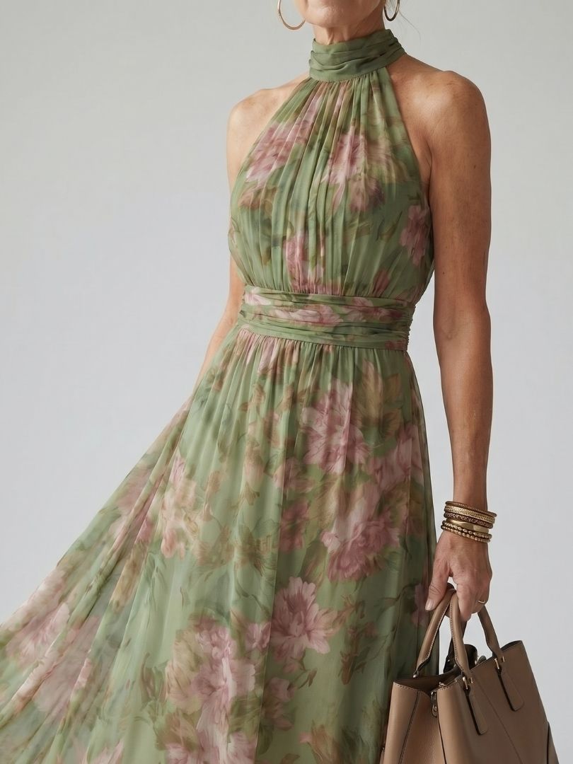 Naomi halter maxi dress by THE WHITMORE FAMILY featuring a gathered bodice and flowing silhouette, shown in a natural fabric.