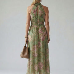 Naomi halter maxi dress by THE WHITMORE FAMILY featuring a gathered bodice and flowing silhouette in a quiet, elegant design.