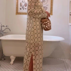 Beige Judy floral long sleeve midi dress by THE WHITMORE FAMILY, featuring a fitted bodice and flowing skirt.