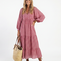 Arlette geometric print long sleeve midi dress by THE WHITMORE FAMILY, featuring a stylish pattern and fitted silhouette.