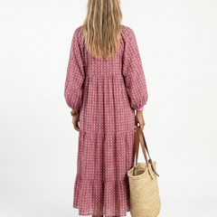 Arlette geometric print long sleeve midi dress by THE WHITMORE FAMILY, featuring a stylish pattern and elegant silhouette.