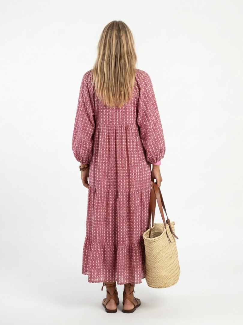 Arlette geometric print long sleeve midi dress by THE WHITMORE FAMILY, featuring a stylish pattern and elegant silhouette.