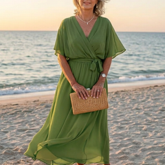 Elysia V neck draped waist tie midi dress by THE WHITMORE FAMILY, featuring a flowy silhouette and elegant design.