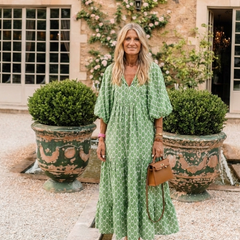 A patterned midi dress with three-quarter sleeves and a V-neck, styled in a relaxed fit from THE WHITMORE FAMILY Apolline collection.