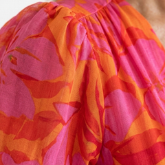 Willow floral V-neck puff sleeve midi dress by THE WHITMORE FAMILY, featuring a flowing midi length and floral pattern.