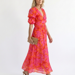 Willow floral V-neck puff sleeve midi dress by THE WHITMORE FAMILY, featuring a flowy midi length and floral pattern.
