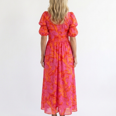 Willow floral V-neck puff sleeve midi dress by THE WHITMORE FAMILY, featuring a feminine floral pattern and elegant midi length.