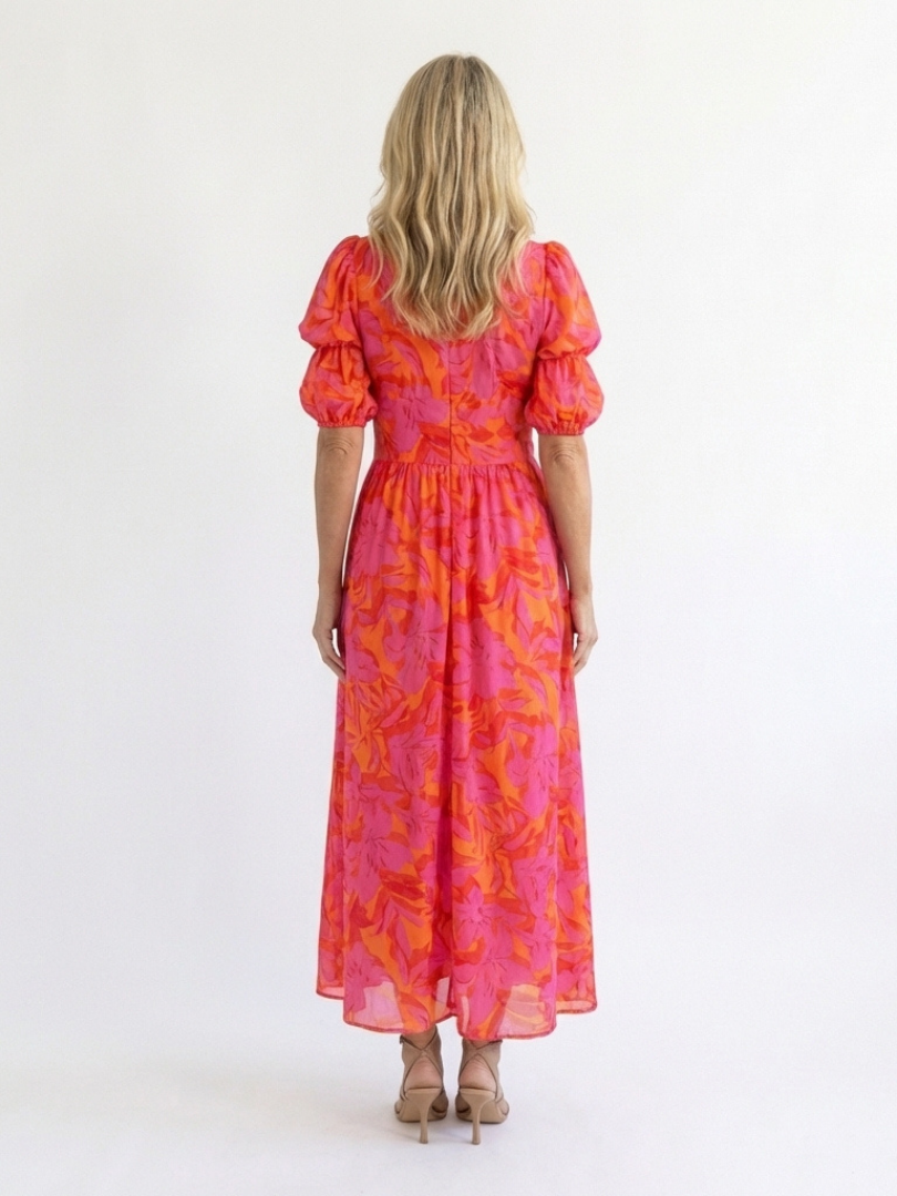 Willow floral V-neck puff sleeve midi dress by THE WHITMORE FAMILY, featuring a feminine floral pattern and elegant midi length.