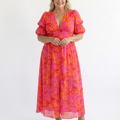 Willow floral V-neck puff sleeve midi dress by THE WHITMORE FAMILY, featuring a flowy fit and elegant midi length.