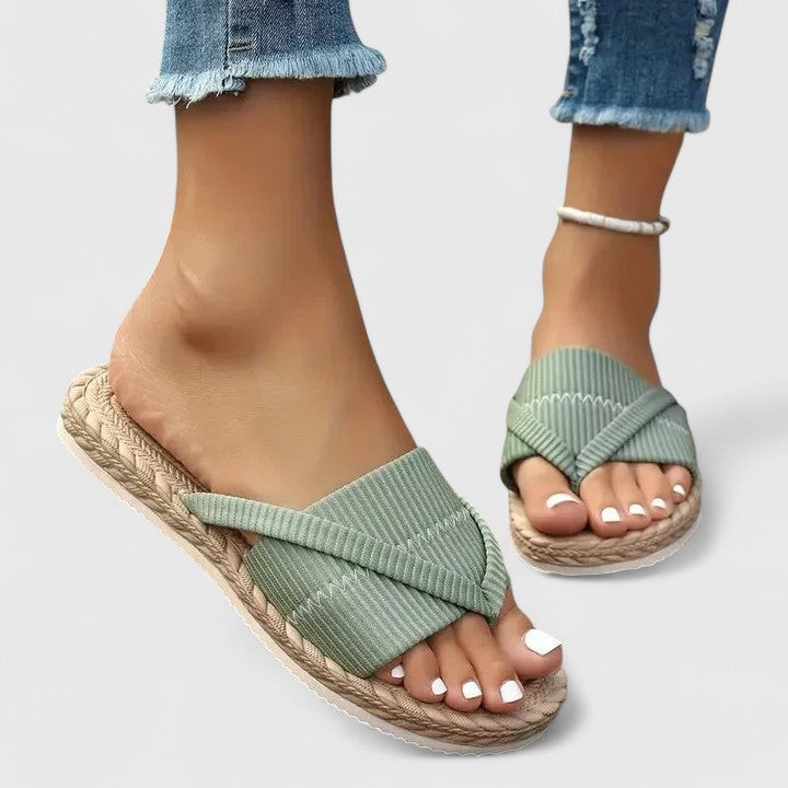 Mint green Gisandra™ orthopedic sandals by THE WHITMORE FAMILY, featuring cushioned straps and supportive soles.