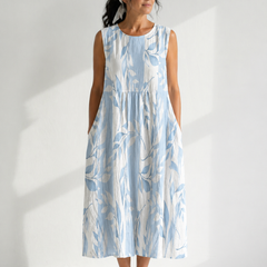 Joy™ Leafy Midi Dress by THE WHITMORE FAMILY, sleeveless multicolor midi dress with leafy pattern, perfect for casual wear.