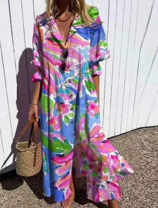 Colorful Rimmey Beachcomber Boho Dress by THE WHITMORE FAMILY with a relaxed, flowy design and vibrant patterns.