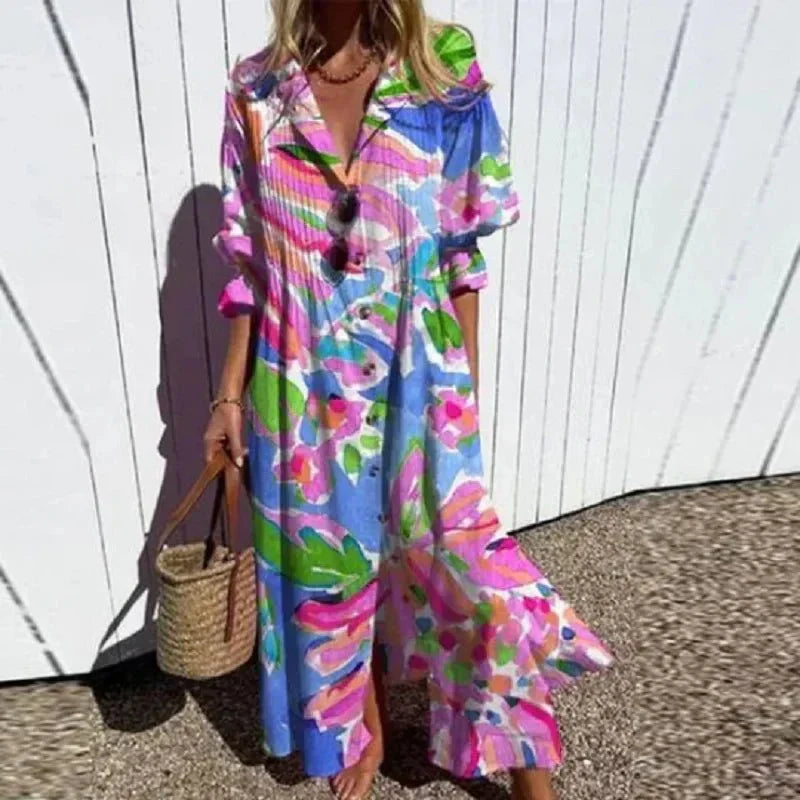 Colorful Rimmey Beachcomber Boho Dress by THE WHITMORE FAMILY with a relaxed, flowy design and vibrant patterns.