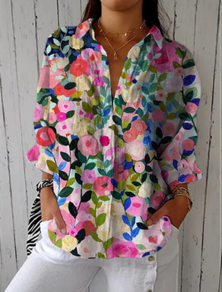 Amandine™ Bloom Canvas Blouse by THE WHITMORE FAMILY in multicolor, featuring a floral pattern and lightweight fabric.