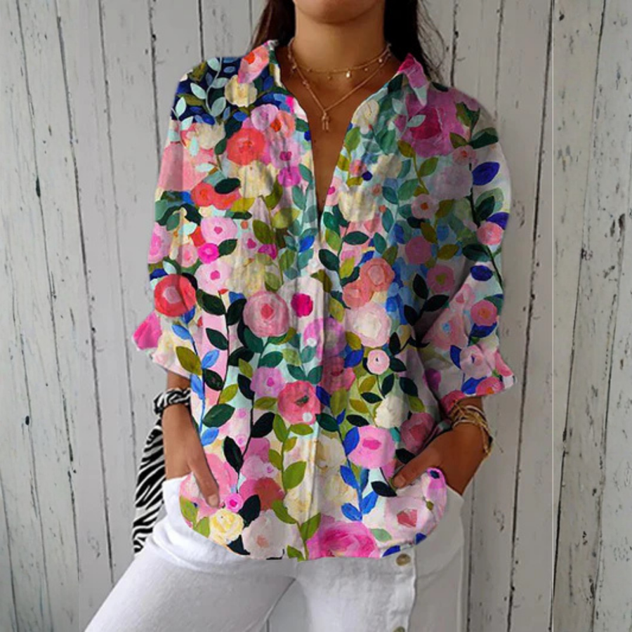 Amandine™ Bloom Canvas Blouse by THE WHITMORE FAMILY in multicolor, featuring a floral pattern and lightweight fabric.