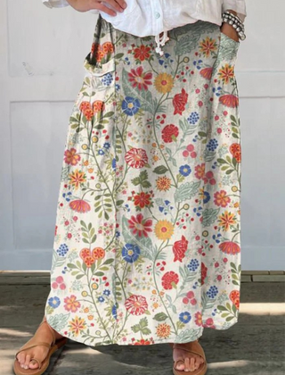 Fabi floral print elastic waistband pocket skirt by THE WHITMORE FAMILY, multicolor pattern, lightweight and casual for everyday wear.
