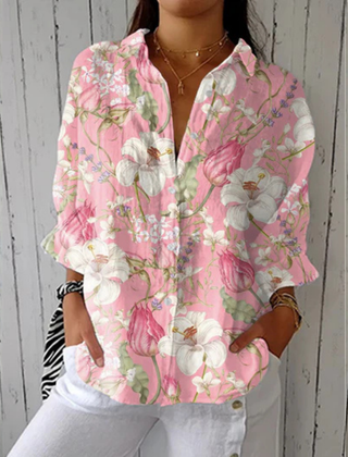 Multicolor Hannah™ Elegant Bloom Blouse from THE WHITMORE FAMILY featuring floral pattern, lightweight fabric, and stylish design.