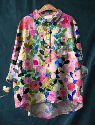 Isabelle vibrant floral shirt by THE WHITMORE FAMILY featuring colorful floral pattern and lightweight fabric.