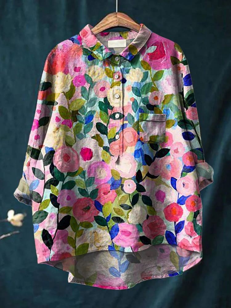 Isabelle vibrant floral shirt by THE WHITMORE FAMILY featuring colorful floral pattern and lightweight fabric.