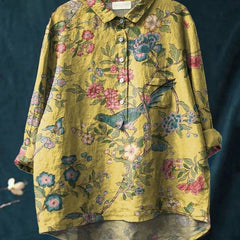 Vibrant floral embroidered shirt from THE WHITMORE FAMILY's Lina collection, featuring multicolor floral patterns and lightweight fabric.