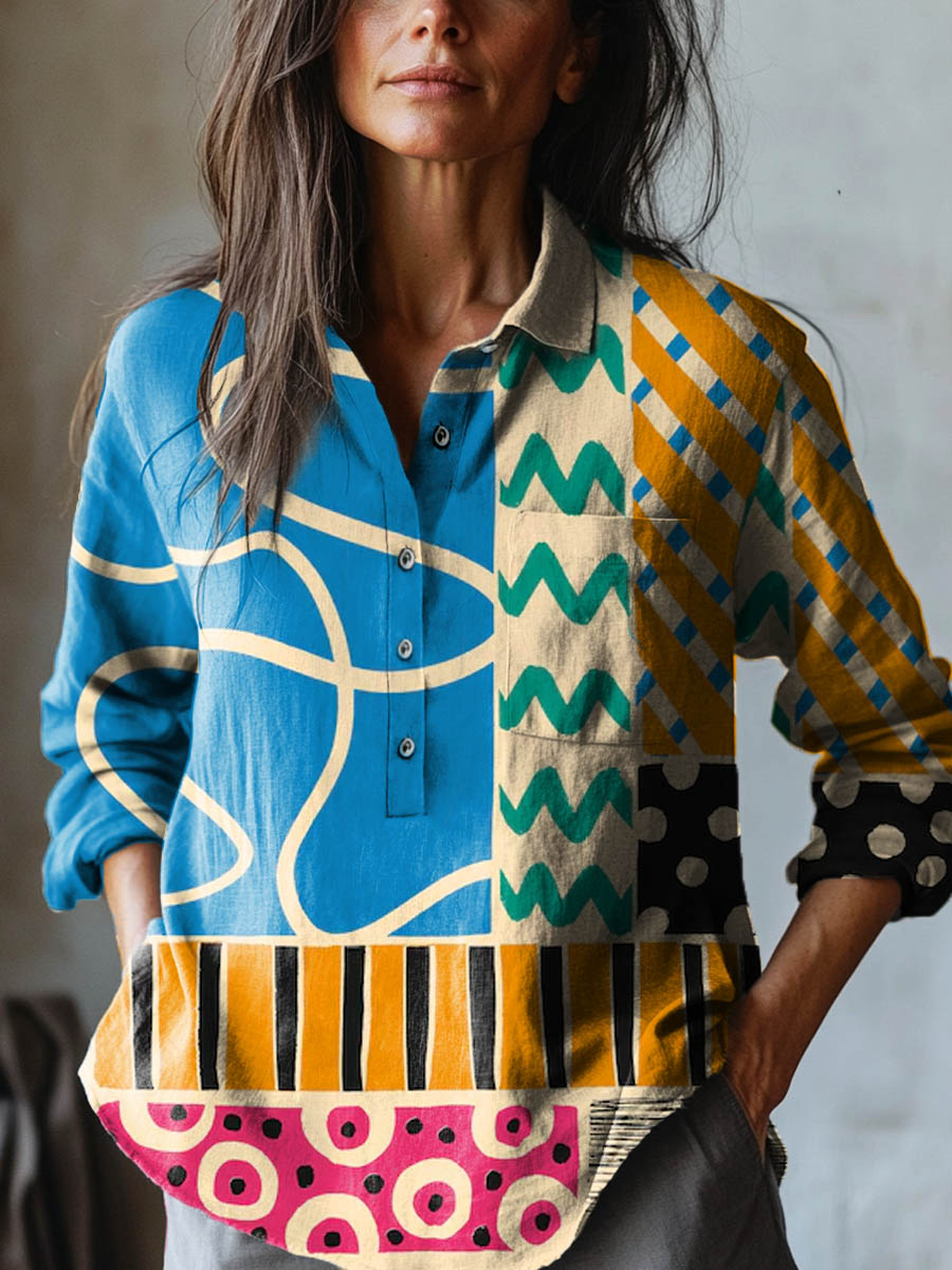 Colorful geometric print shirt from THE WHITMORE FAMILY's Mira collection, featuring vibrant patterns and a modern design.