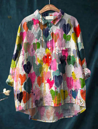 Valentina colorful heart print shirt by THE WHITMORE FAMILY featuring vibrant multicolor heart designs on soft fabric.