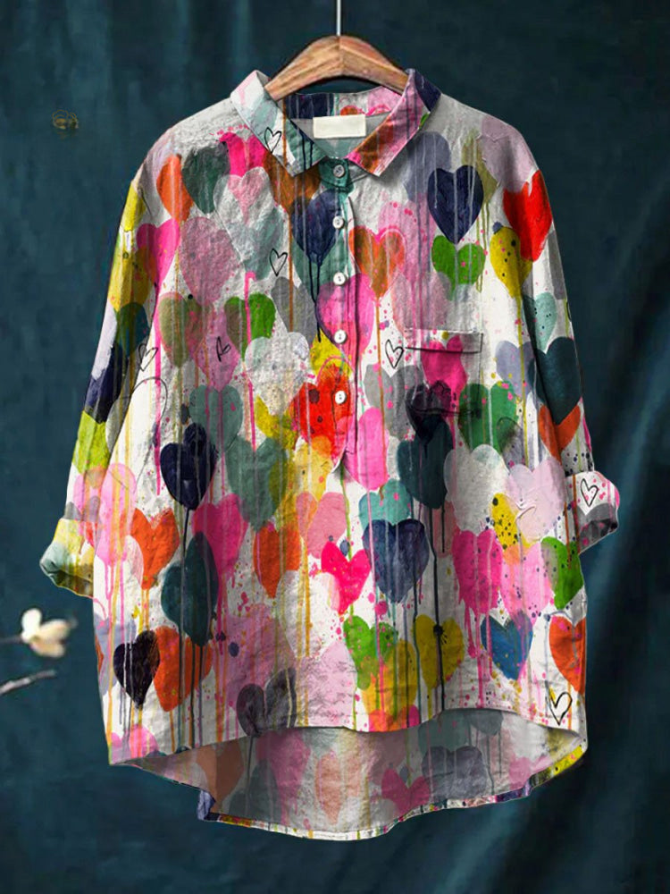 Valentina colorful heart print shirt by THE WHITMORE FAMILY featuring vibrant multicolor heart designs on soft fabric.