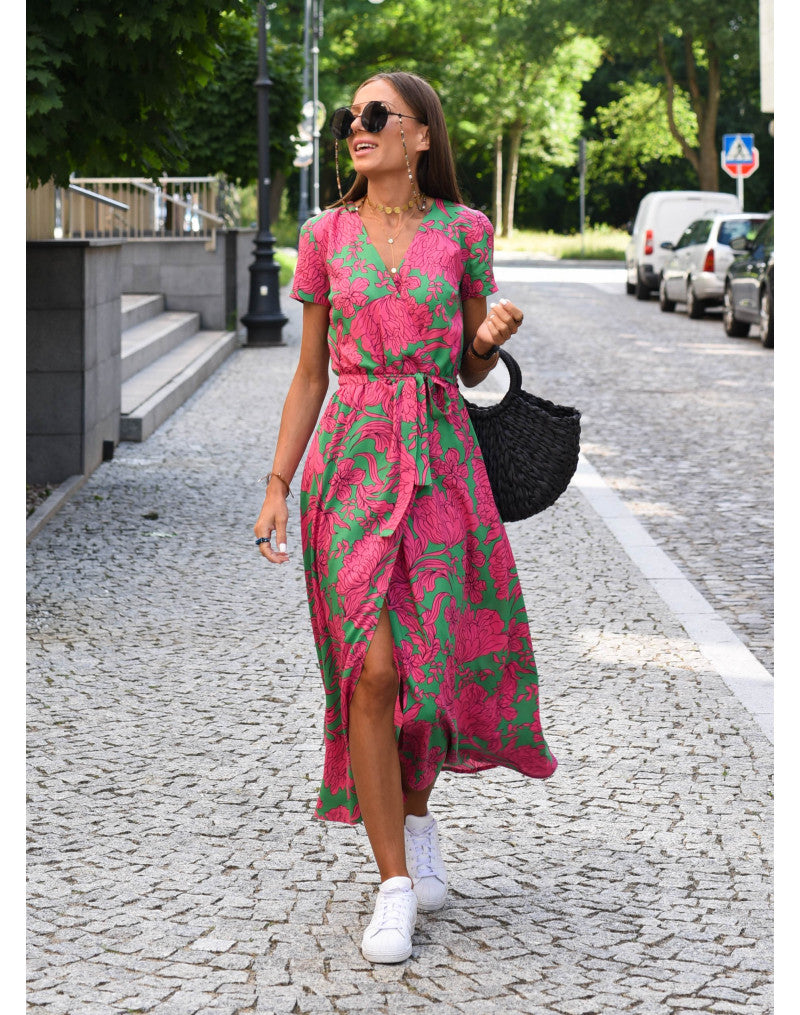 Multicolored floral V-neck dress by THE WHITMORE FAMILY, featuring a stylish design and lightweight fabric.
