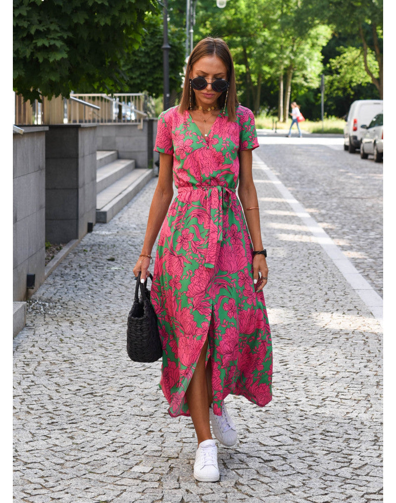 Multicolored floral V-neck dress by THE WHITMORE FAMILY, featuring a stylish and elegant design perfect for casual or formal wear.
