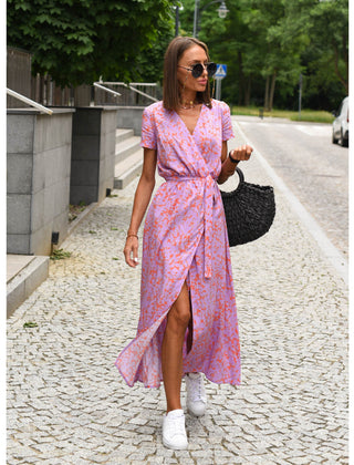 Multicolored Judy stylish V-neck floral dress by THE WHITMORE FAMILY, featuring a vibrant floral pattern and a flattering V-neckline.