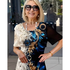 Navy printed Viviana relaxed dress by THE WHITMORE FAMILY, with flowy fabric and casual style, displayed on a model.