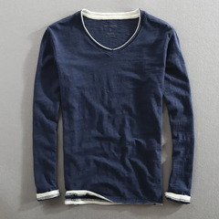 Navy blue Kaido™ Cotton Long Sleeve Shirt by THE WHITMORE FAMILY, shown flat with button-up front and collar.