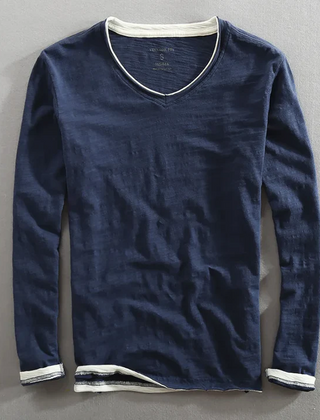 Navy blue Kaido™ Cotton Long Sleeve Shirt by THE WHITMORE FAMILY, shown flat with button-up front and collar.