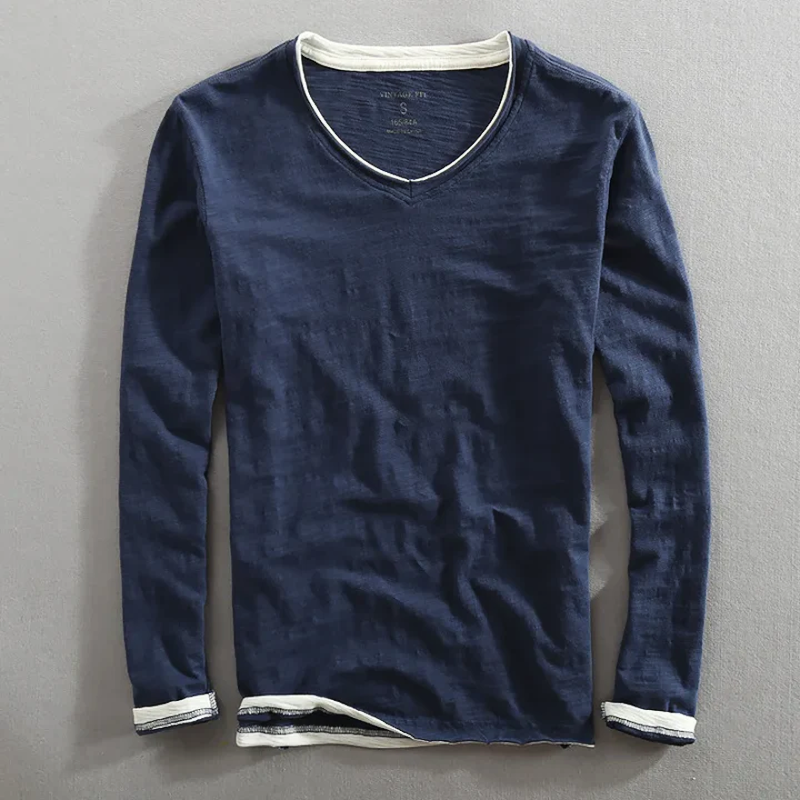 Navy blue Kaido™ Cotton Long Sleeve Shirt by THE WHITMORE FAMILY, shown flat with button-up front and collar.
