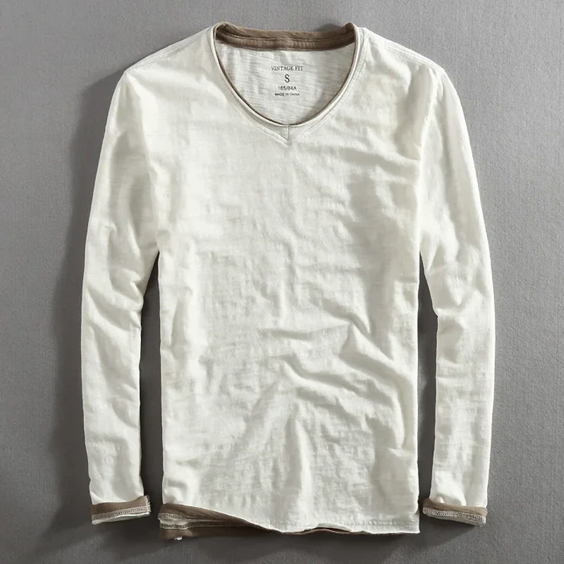Navy blue Kaido™ cotton long sleeve shirt by THE WHITMORE FAMILY, shown flat with button front and classic collar.