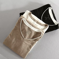 Navy blue Kaido™ Cotton Long Sleeve Shirt by THE WHITMORE FAMILY, shown on a hanger with a close-up of fabric and collar details.