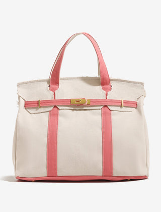 The Camille Boat Tote by THE WHITMORE FAMILY, showing a stylish fabric tote with leather handles and spacious interior.
