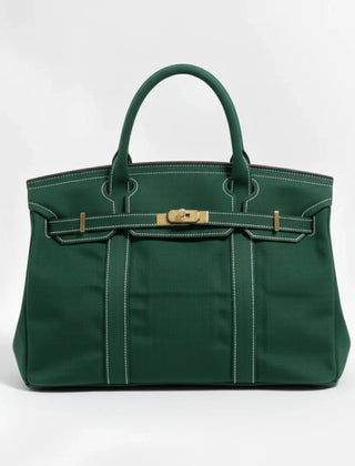 Dark green Camille Boat Tote by THE WHITMORE FAMILY featuring sturdy canvas material and leather handles.