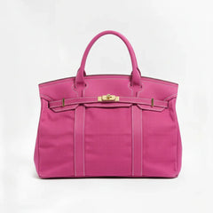 Pink Camille Boat Tote by THE WHITMORE FAMILY with sturdy handles and spacious interior for daily use and shopping.