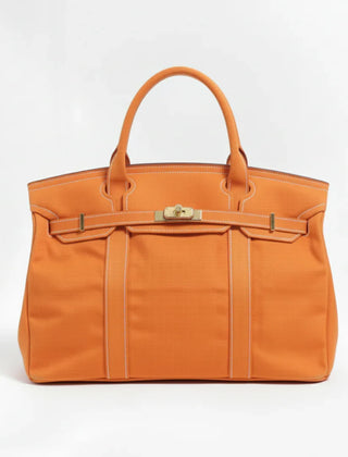Orange Camille Boat Tote by THE WHITMORE FAMILY with sturdy handles and spacious interior, perfect for everyday use.