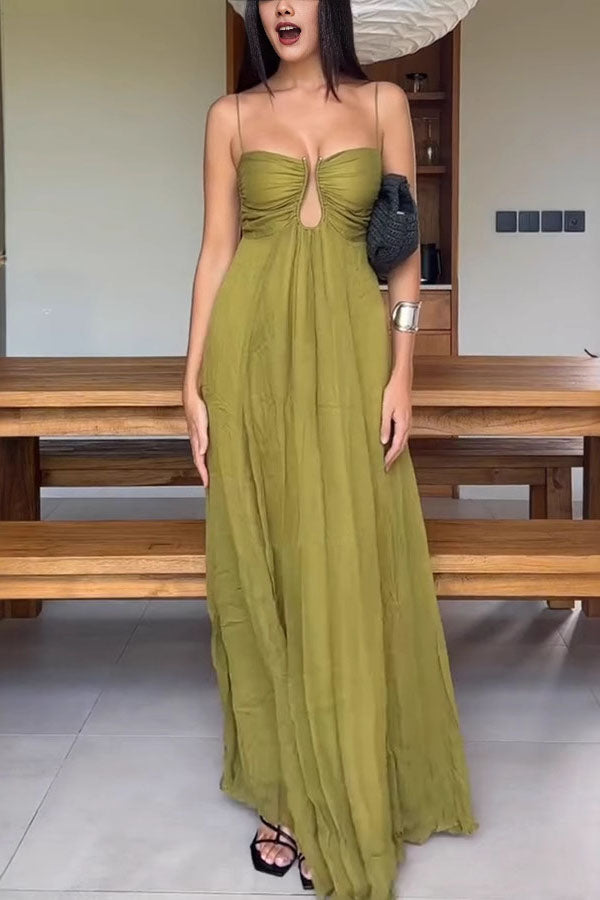 Stylish green guest dress by THE WHITMORE FAMILY with elegant design, perfect for formal events and gatherings.