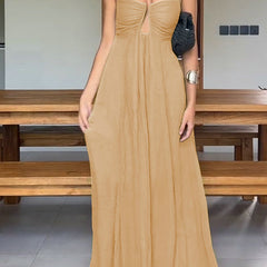 Elegant green guest dress by THE WHITMORE FAMILY featuring a stylish design and flattering fit for special occasions.